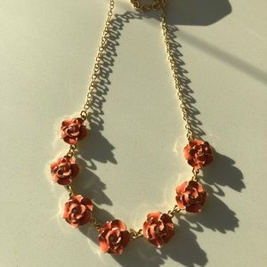 Orange and gold rose necklace.
